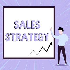 Word writing text Sales Strategy. Business photo showcasing Plan for reaching and selling to your target market Marketing View young man standing pointing up blank rectangle Geometric background