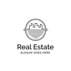 Modern minimalistic skyscraper city building inside circle frames real estate logo design