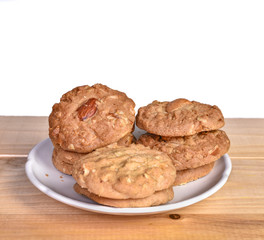 Pile of Delicious Almond Cookies on a White Plate
