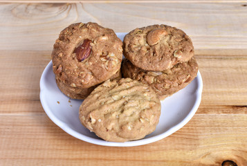 Pile of Delicious Almond Cookies on a White Plate