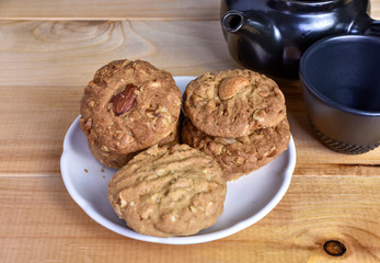 Pile of Delicious Almond Cookies on a White Plate