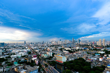 photos of modern city  and tall buildings in Bangkok in the evening