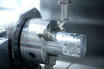 Close up CNC milling/drilling machine working process on metal factory,Industrial metal work process at steel structure industry.