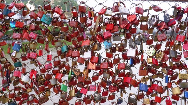 Many Colorful Locks Hanging on Handrails on Love Bridge in Salzburg, Austria