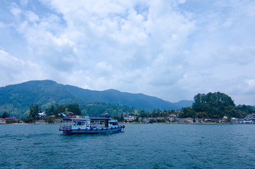 a ship anchored at Lake Toba, North Sumatra, Indonesia