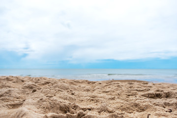 Fototapeta na wymiar Landscape image of sand on tropical beach with blue sky background