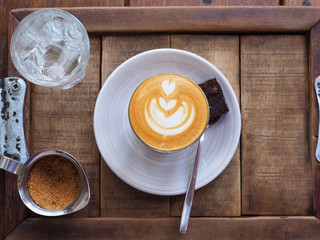 Top view Hot coffee brown sugar and water on wooden.