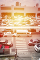 Vintage blur of car at public car parking