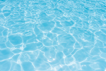 Naklejka na ściany i meble water in swimming pool rippled water detail