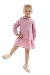 Cute little girl in a light summer dress.