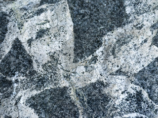The texture of gray stone. Stone background. Natural material for construction..