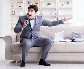 Drunk businessman celebrating in the office