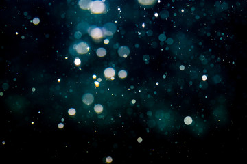 Obraz premium Rozmycie bokeh światła na czarnym tle