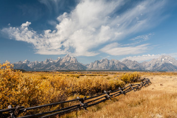 Old fence line in front of the grand teton mountain range, Grand Teton National Park, Wyoming 