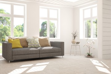 Stylish room in white color with sofa and summer landscape in window. Scandinavian interior design. 3D illustration