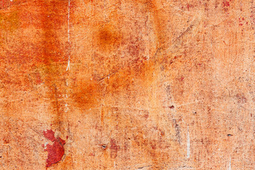 Texture of a concrete wall with cracks and scratches which can be used as a background