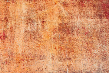 Texture of a concrete wall with cracks and scratches which can be used as a background