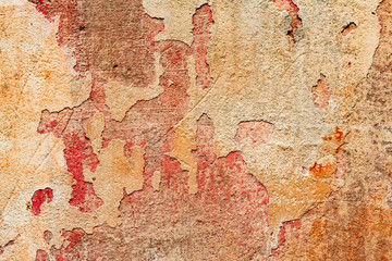 Texture of a concrete wall with cracks and scratches which can be used as a background