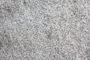 Grey granite unpolished slab. Urban texture.