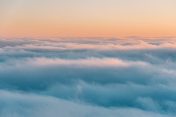 View of marine layer low clouds over Los Angeles at sunset, from Mount Wilson, in Angeles National Forest, California