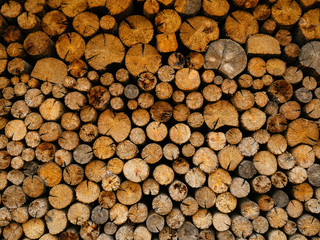 Neatly stacked firewood for kindling the oven in winter