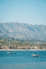 Fototapeta na wymiar Sailboats in the Pacific Ocean, seen from Stearns Wharf, in Santa Barbara, California