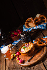 rustic Bavarian obazda with radishes and onions