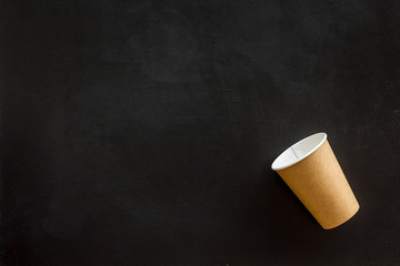 paper cups for coffee to take away on black background copyspace