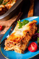 spicy lasagne with tomato sauce and basil