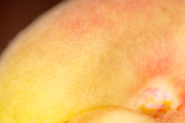 Ripe juicy peach as a background