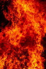Flame of fire from a burning house as an abstract background