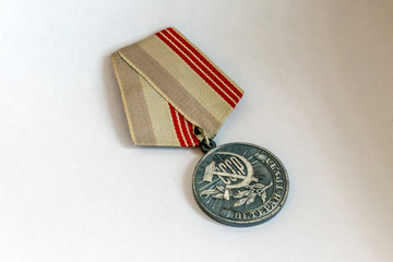 USSR Veteran of Labor medal in silver color on a white background