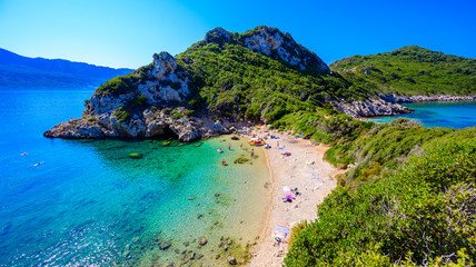 Porto Timoni beach at Afionas is a paradise double beach with crystal clear azure water in Corfu, Ionian island, Greece, Europe - obrazy, fototapety, plakaty