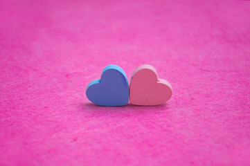 Two hearts on a pink background. Greeting card Happy Valentine's Day.