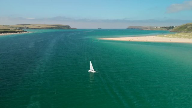 Aerial of Two Small Sailing Boats near Rock and Padstow in Cornwall.