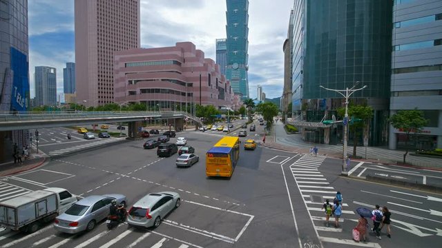 Taipei, Taiwan- 9 June, 2019: Taipei 101 tower with traffic on road at night in Taipei, Taiwan