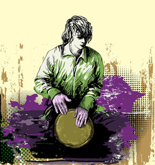 Man, drummer playing the djembe