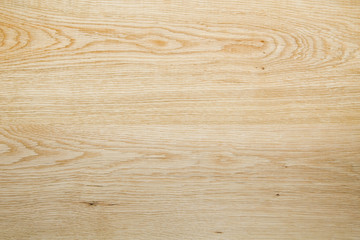 Natural light oak wood texture for background and design. Close-up.From two boards.
