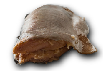 Naklejka premium Salted pink salmon without skin. View from the front and backlight. Isolated image . A popular snack. A site about fish, cuisine and cookery.