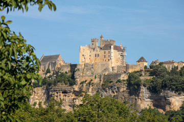 Fototapeta premium The medieval Chateau de Beynac rising on a limestone cliff above the Dordogne River. France, Dordogne department, Beynac-et-Cazenac