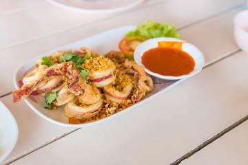 Deep fried squid ( calamari rings ).