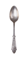 Old silver spoon over on an isolated white background, top view .