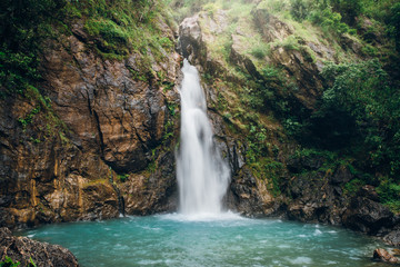Naklejka premium Waterfall in autumn forest at Erawan National Park, Thailand