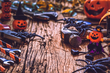 Happy Halloween day with construction DIY handy tools on rusty wooden background concept with copy space.