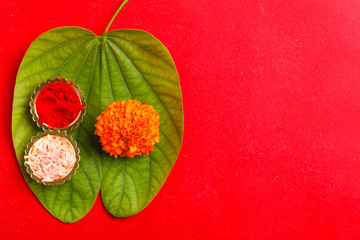 Happy Dussehra greeting card , green leaf and rice