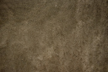 Onde sulla sabbia in spiaggia d'estate