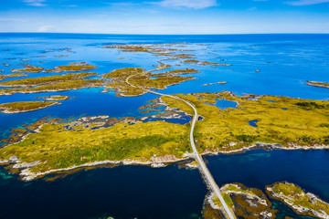 Scenic aerial view of beautiful road with bridge on the island Smola, Norway