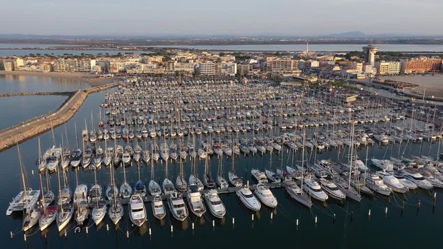 Boats in an harbour Palavas-les-Flots France Montpellier in background Pic Saint Loup sunrise 