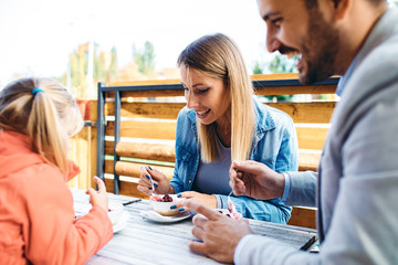 Family in the Restaurant