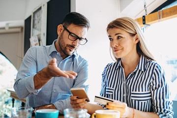 Couple enjoying in Coffee Shop